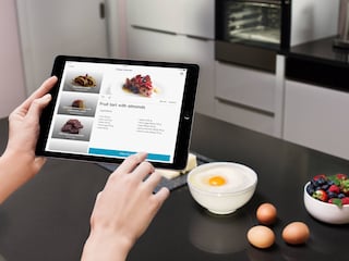Selecting a recipe from the My Electrolux App on a tablet