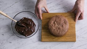 Chocolate icing in a mixing bowl