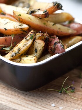 Potato wedges steam roasted with herbs