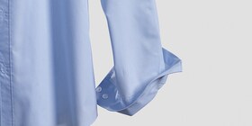 An unbuttoned blue shirt