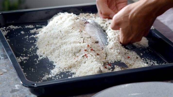 Cover fish in salt